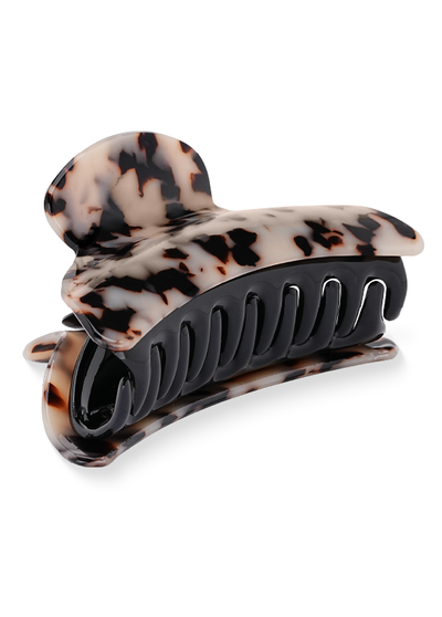 Blonde tortoise shell claw clip with black metal grip and curved jaw design for hair styling.