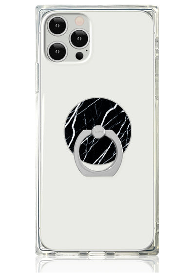 Clear phone case with black marble-patterned circular ring stand attached to back.