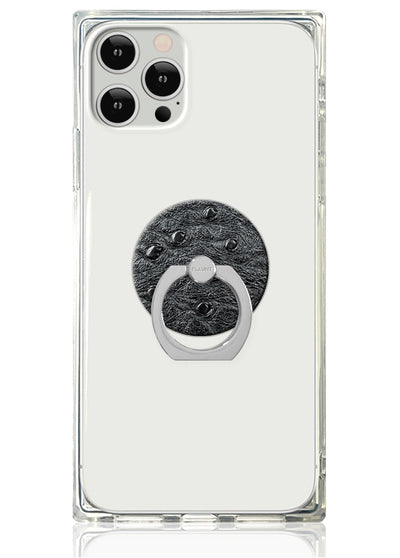 Clear phone case with black textured circular ring stand attached to back.