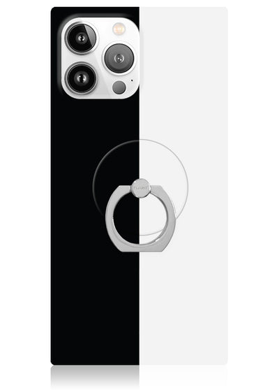 Black and white colorblock phone ring stand with circular grip attached to smartphone camera module.