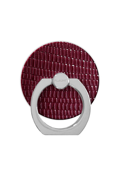 Burgundy lizard-textured circular backing with silver metal ring stand and branded center knob.