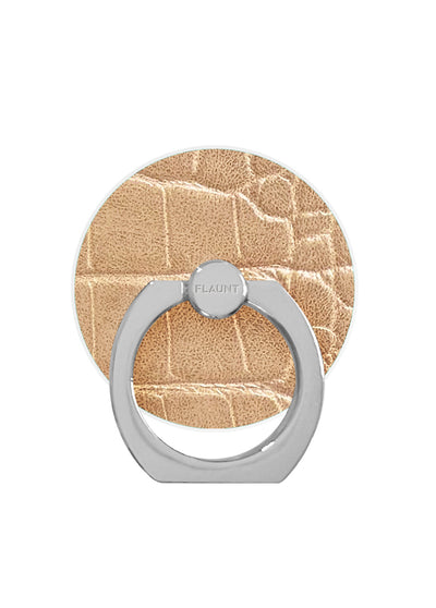 Tan crocodile-textured phone ring stand with gray metal loop and adhesive backing.