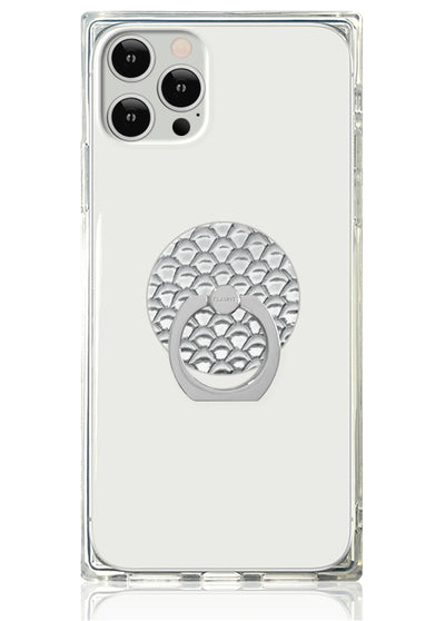 Clear phone case with silver metallic snakeskin-textured circular ring stand attached to back.