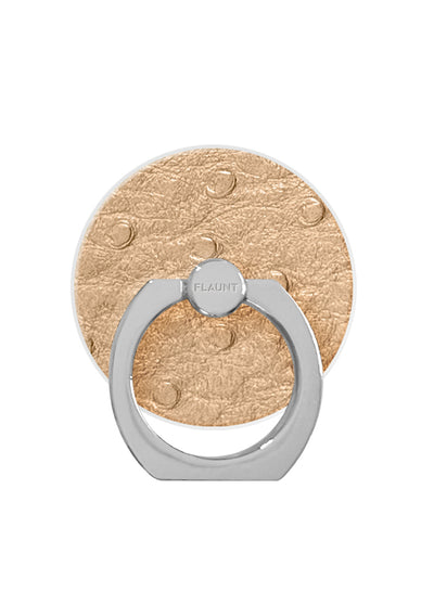 Tan textured faux leather circular phone ring stand with silver metal loop and adhesive dots.