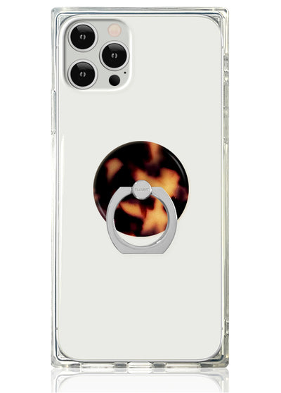 Clear phone case with tortoise shell patterned adhesive ring stand in brown and black tones.