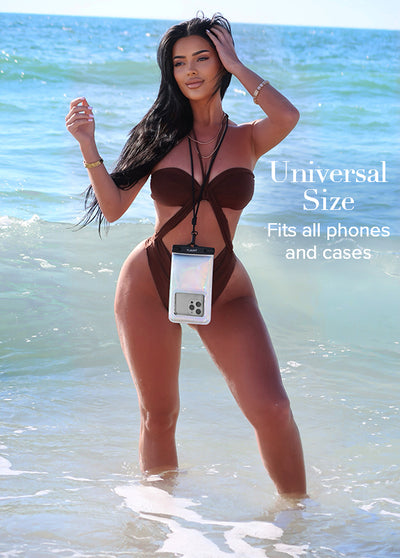 Woman wearing iridescent waterproof phone pouch on lanyard in ocean water.