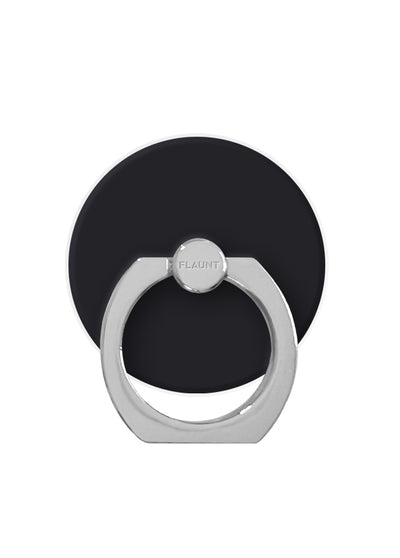 Matte black circular adhesive pad with silver metal ring stand and rotating knob labeled "FLAUNT".