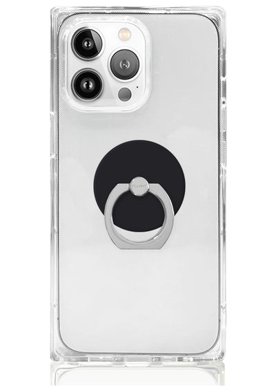 Clear phone case with matte black circular adhesive ring stand and silver metal grip loop.