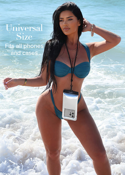 Silver waterproof phone pouch with blue lanyard worn around neck in ocean water.