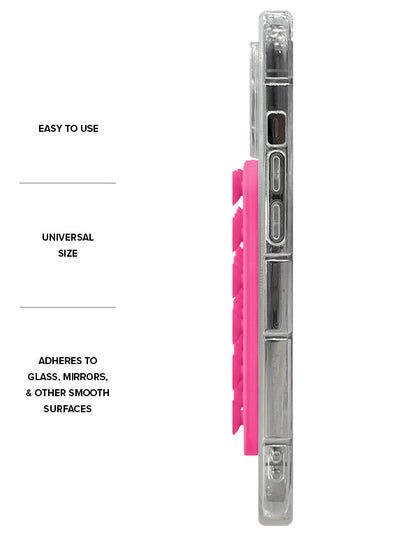 Neon pink MagSafe suction mount with clear protective case and metal attachment rings.