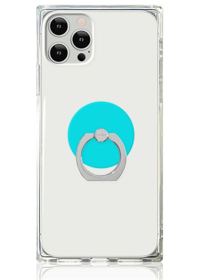 Clear phone case with turquoise circular adhesive ring stand and silver metal grip on back.