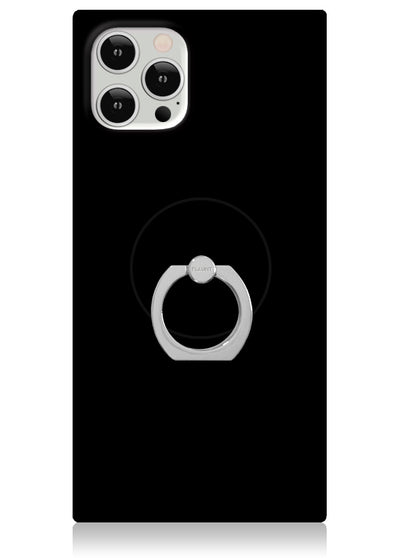 Silver ring stand with rotating grip attached to black phone case, shown on smartphone with triple camera setup.