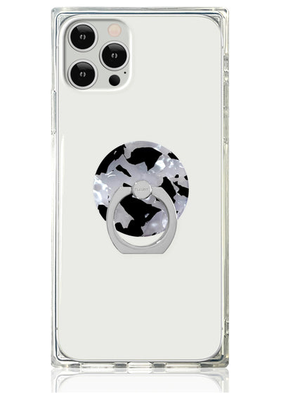 Clear phone case with black and white tortoise shell ring stand attached to back.
