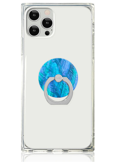 Clear phone case with blue iridescent mother of pearl circular ring stand attached to back.
