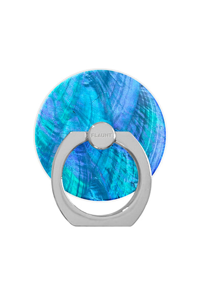 Blue iridescent circular phone ring stand with gray metal attachment and "FLAUNT" branding on grip base.