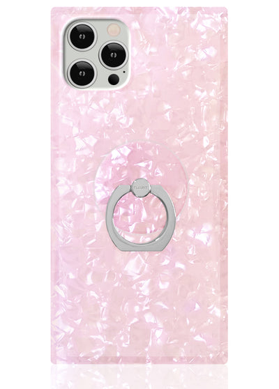 Pink pearl phone case with triple camera cutout and gray metal ring stand attachment.