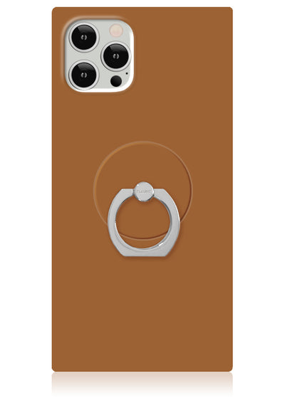 Caramel-colored phone case with white adhesive ring stand attached to back.
