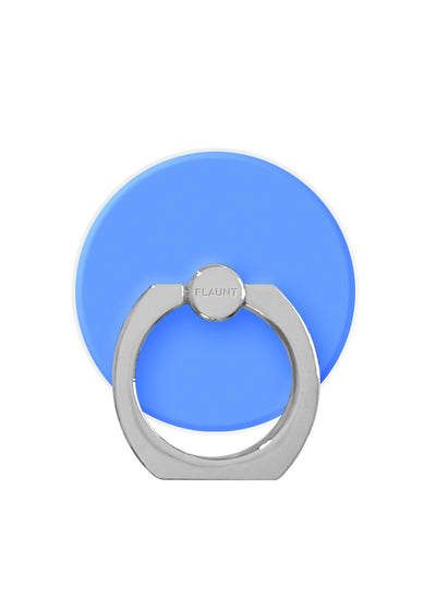 Cornflower blue circular adhesive phone ring stand with silver metal grip and center pivot point labeled "FLAUNT".