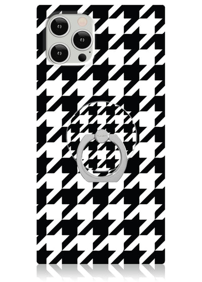 Silver phone ring stand attached to black and white houndstooth patterned phone case.