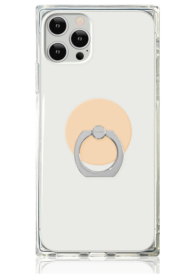 Clear phone case with nude almond adhesive ring stand on back of smartphone.
