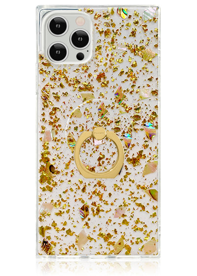 Clear square phone case with scattered gold flakes and shell pieces, featuring a gold ring stand in center.