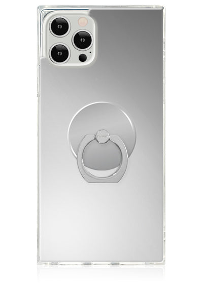 Silver ring stand with circular grip attached to clear phone case on smartphone.