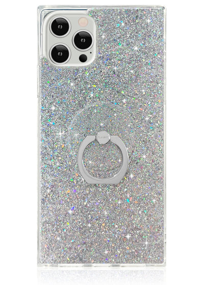 Clear phone case with silver holographic glitter and circular metal ring stand attached at center bottom.