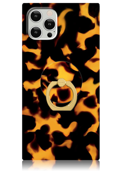 Phone case with tortoiseshell print in gold and black featuring a round metal ring stand attached to the back.