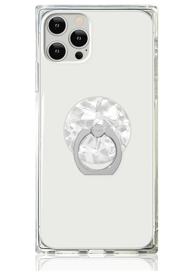 Clear phone case with white pearl crystal ring stand attached to back of iPhone 12 Pro Max.