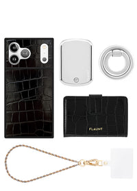["Black", "crocodile-textured", "phone", "case,", "white", "compact", "mirror,", "clear", "ring", "holder,", "black", "wallet,", "and", "gold", "chain", "wristlet."]