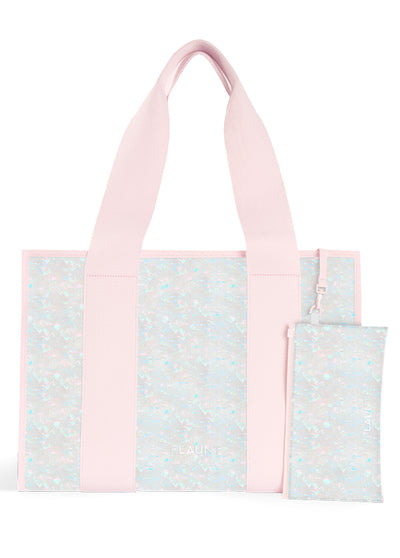 Pink tote bag with floral patterned panels and two matching smaller pouches included in set.